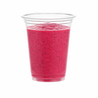 A clear plastic cup filled with a bright pink smoothie, photographed against a plain white background.