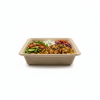 Food Packaging Direct 1200ml square sugarcane bowl filled with a fresh salad featuring grilled chicken and vegetables.